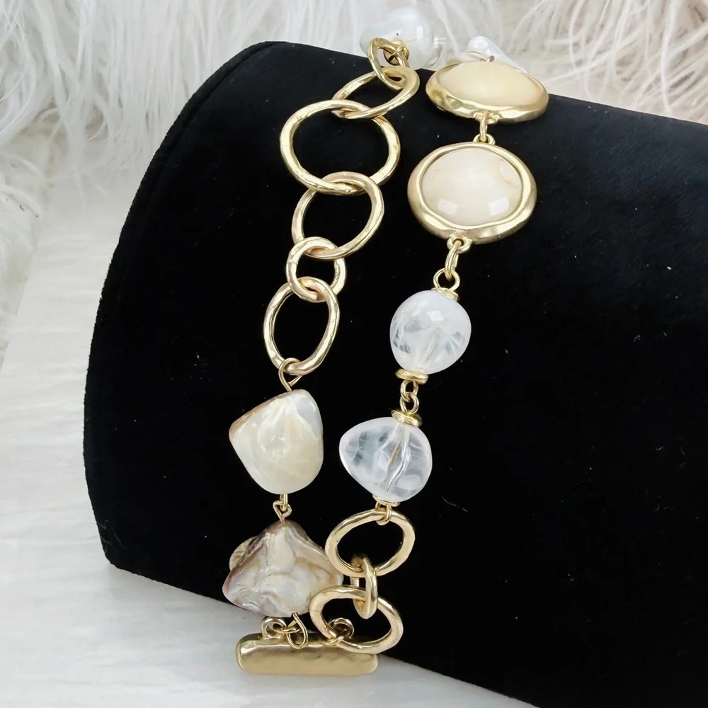 Elegant Goldtone and Cream two strand magnetic closure Bracelet